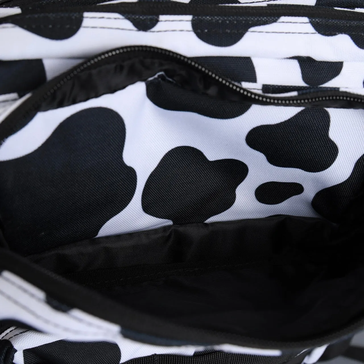 25L Backpack Black White Cow