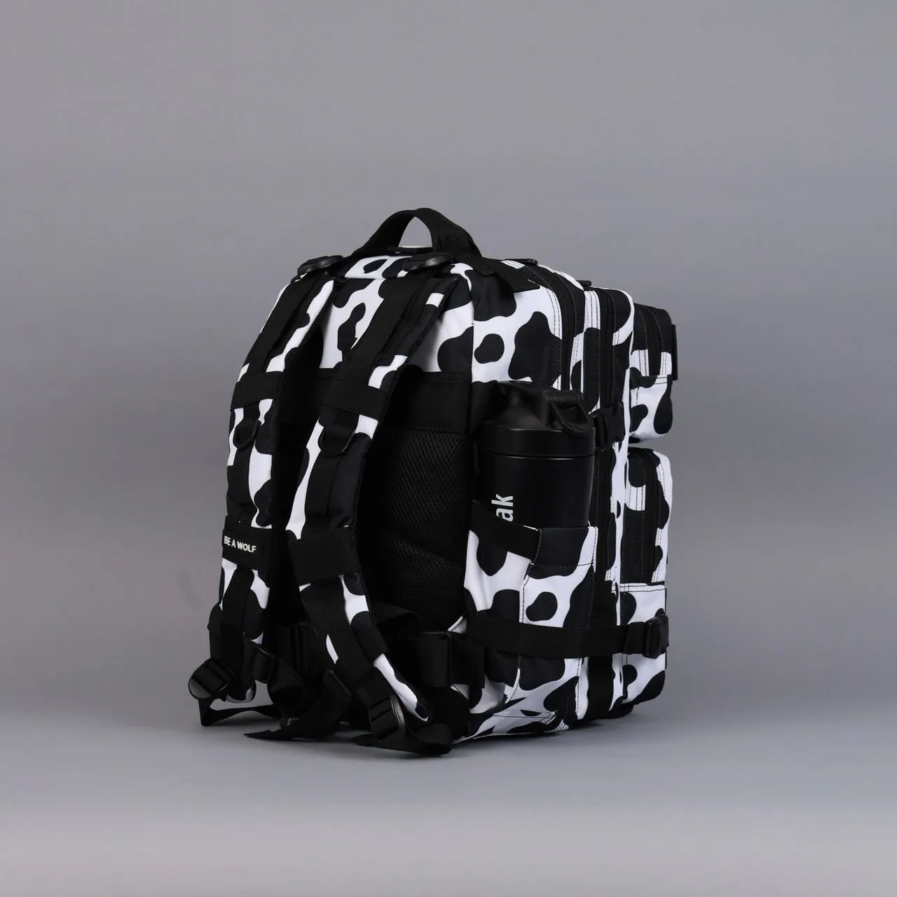 25L Backpack Black White Cow