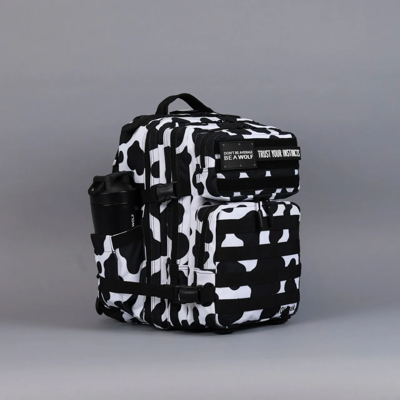 25L Backpack Black White Cow