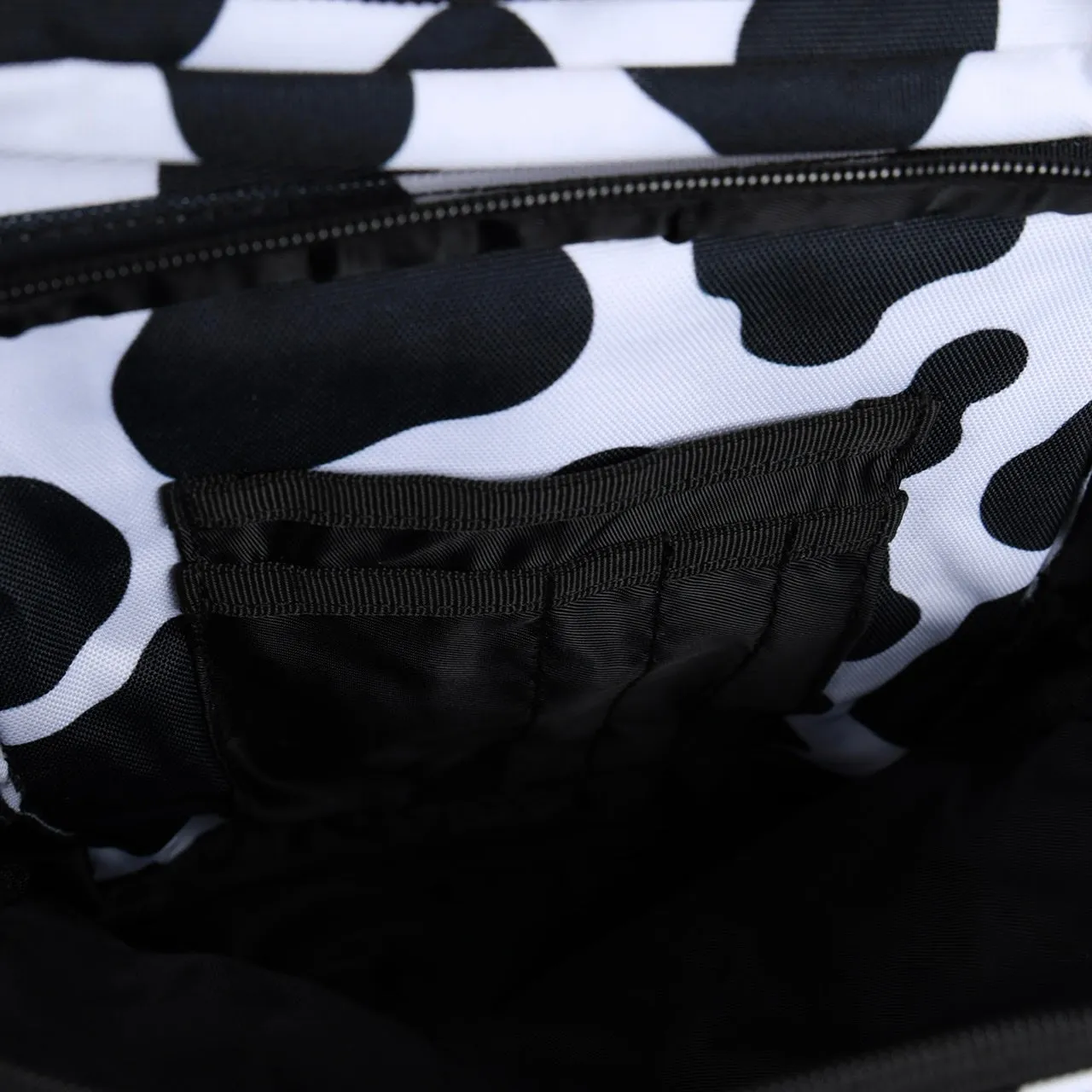 25L Backpack Black White Cow