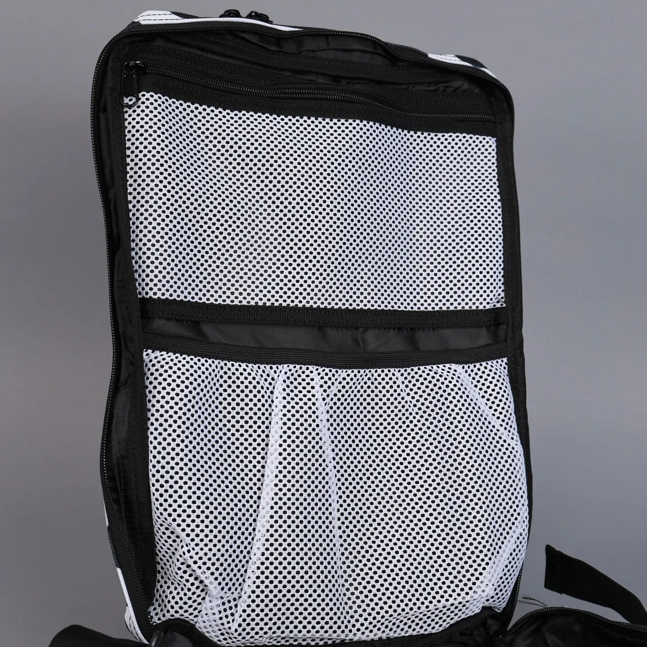 25L Backpack Black White Cow