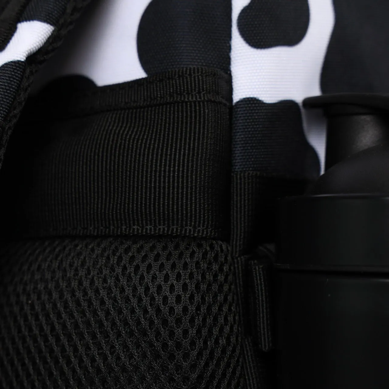 25L Backpack Black White Cow